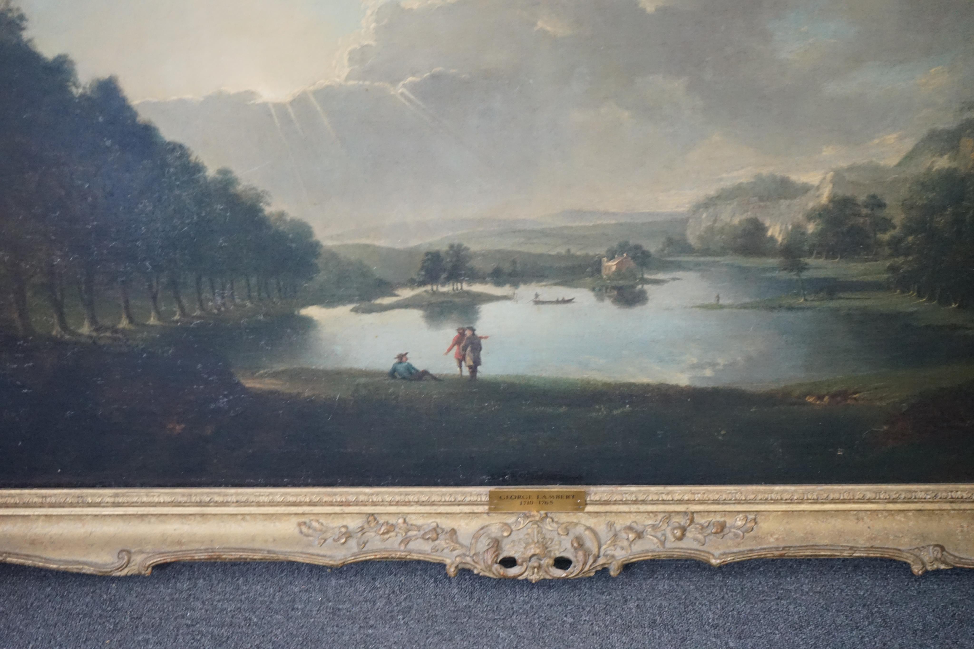 Attributed to George Lambert (English, 1710-1765), Extensive lake scene with figures in foreground, oil on canvas, 72 x 153cm